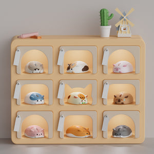 A cabinet showcasing a variety of Akko Cat Theme Mouse arranged for display.