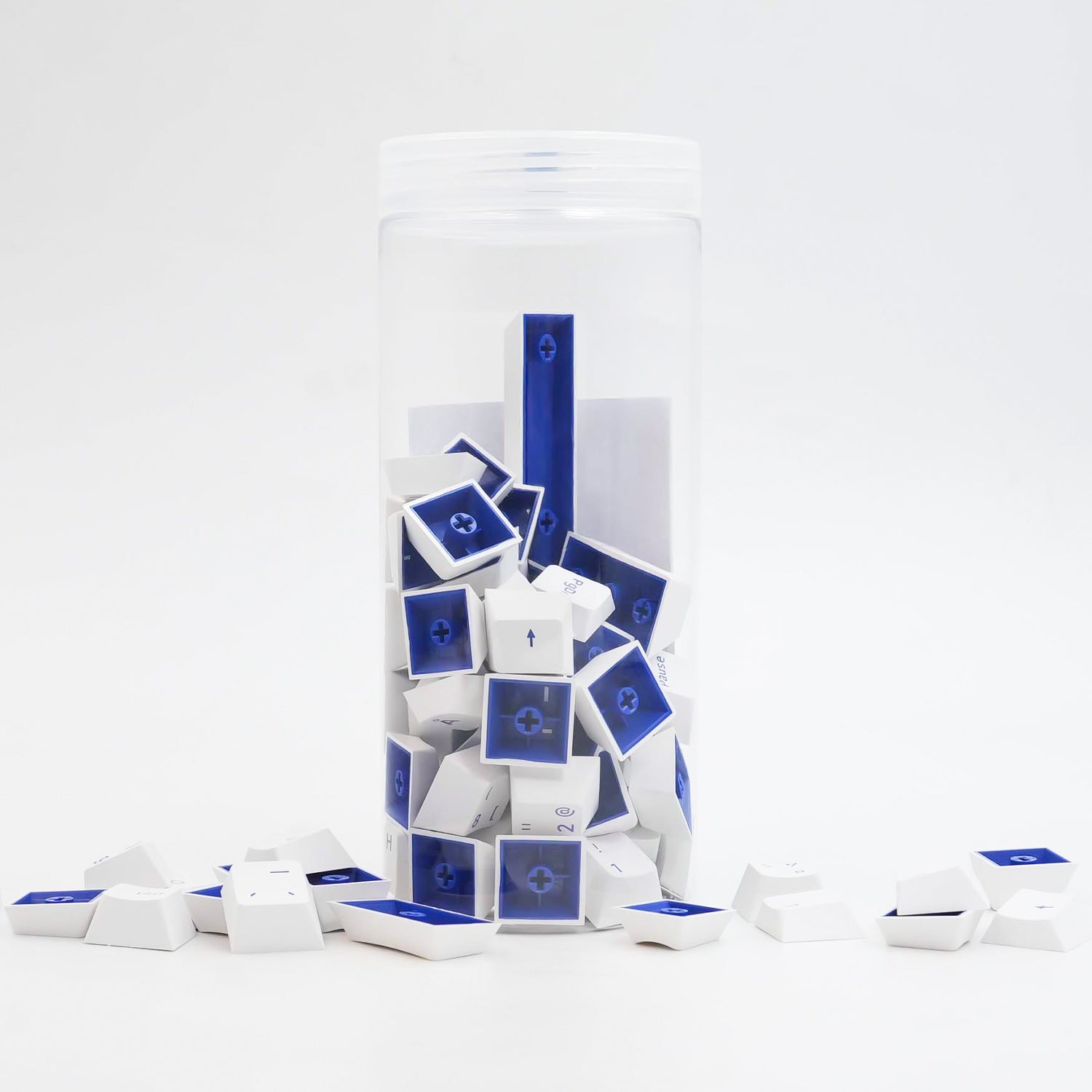 Blue on White ISO Nordic Tastenkappen Set (76-key) in the jar put on the desk