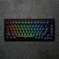 MonsGeek M1 V5 HE Magnetic Keyboard with RGB lighting on a dark textured background