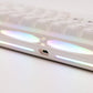Close-up of a Verve68 HE keyboard hollow case with iridescent finish on a white background