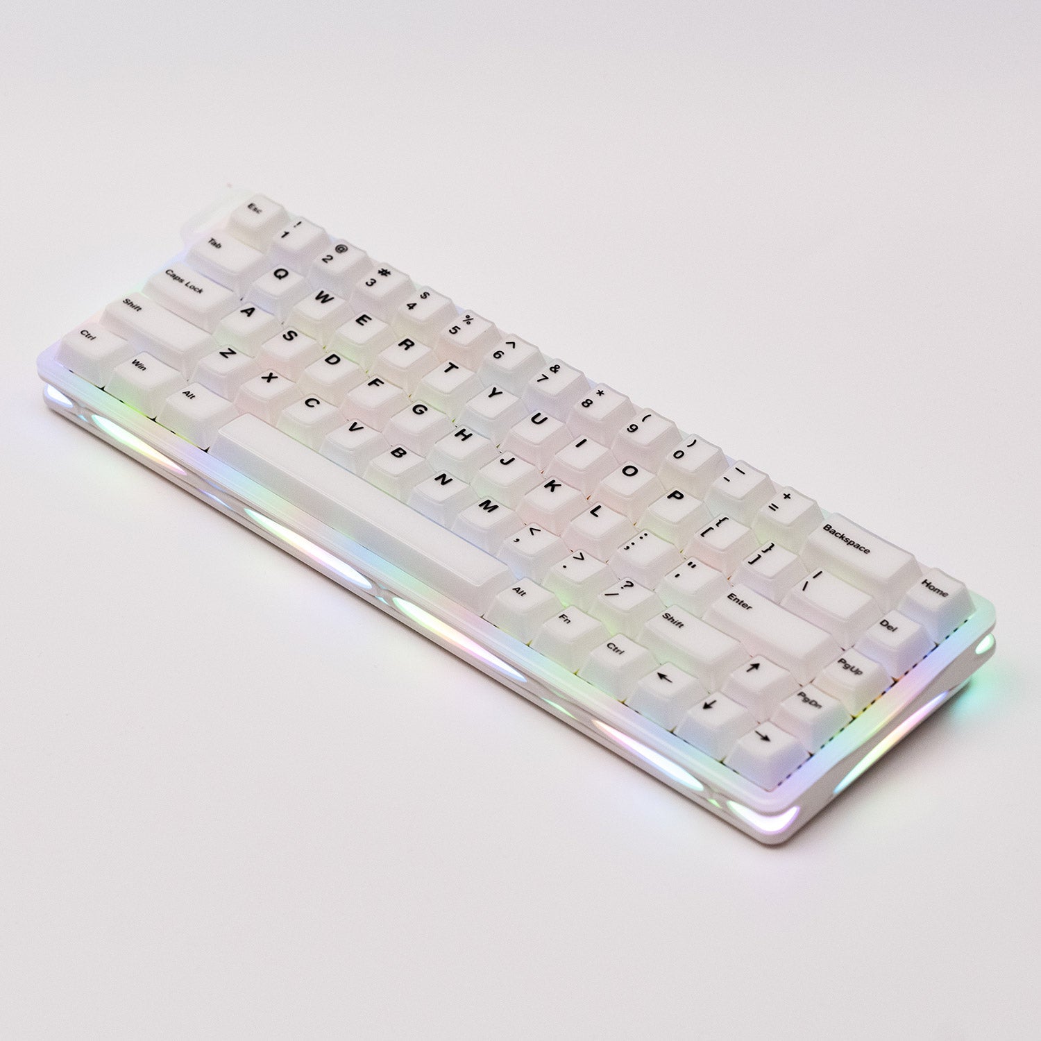 Verve68 HE Keyboard with a rainbow backlit effect on a light gray background